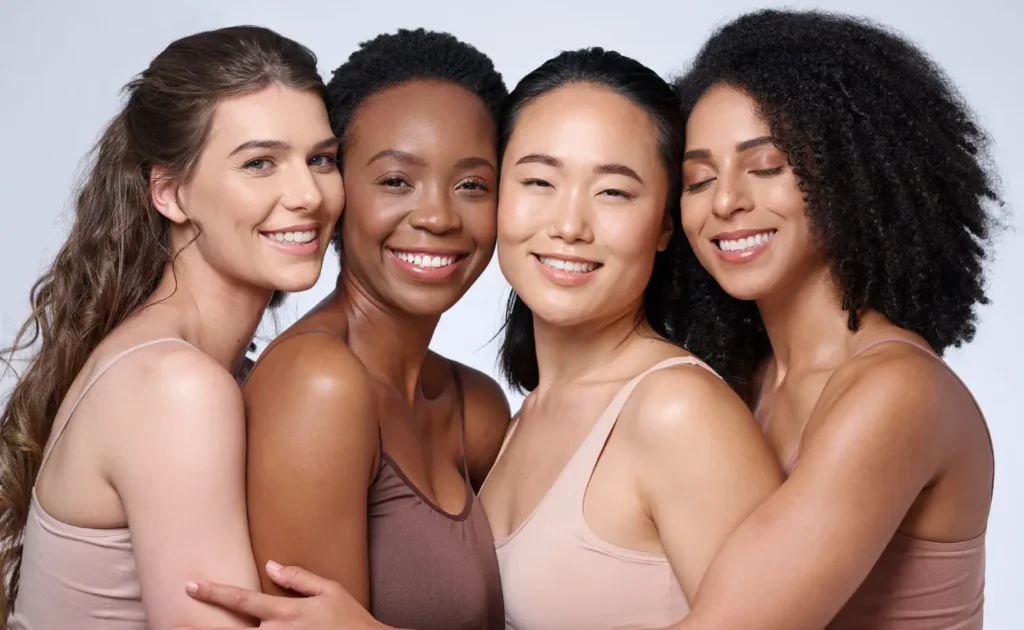 Portfolio 1 Face portrait, beauty and group of women in studio on gray background. Cosmetics, makeup and diversity of female models with glowing and flawless skin after spa facial treatment posing for skincare | Citidrips in Wilmington, DE