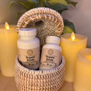 a basket with bottles and candles